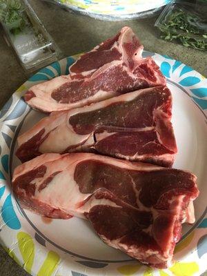 The lamb chops raw