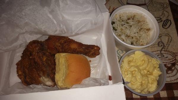 Noms... 2pc Dark Meat Chicken with Spicy Rice and Macaroni Salad. Delish!