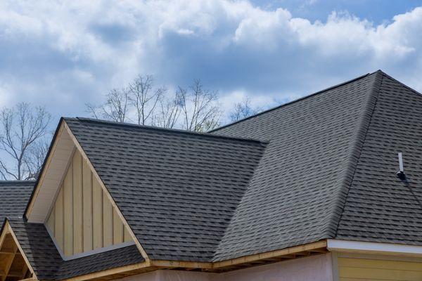 Close view of new shingle application with multiple valleys.