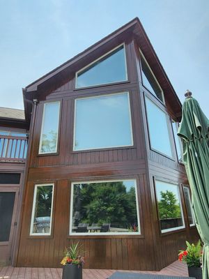 Protect your home from the elements by regularly staining your wood siding.