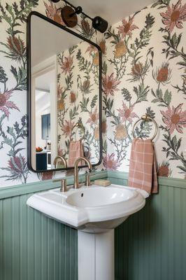 This powder room was updated to a more classic style after the homeowner wanted to upgrade from the 1980s original builder-grade finishes.