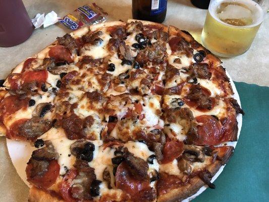 Pizza built anyway you want it. Sausage, pepperoni, mushroom and black olive here.