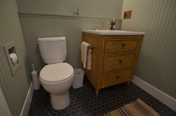 Cozy bathroom with laundry