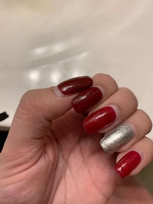 Nail technician too distracted talking to each other that she forgets to add second coat to middle and pinky.No apology was given from staff