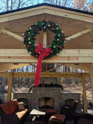 Enjoy your backyard patio and fireplace this holiday