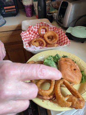 My husband couldn't wait to eat !  He shared his onion rings.