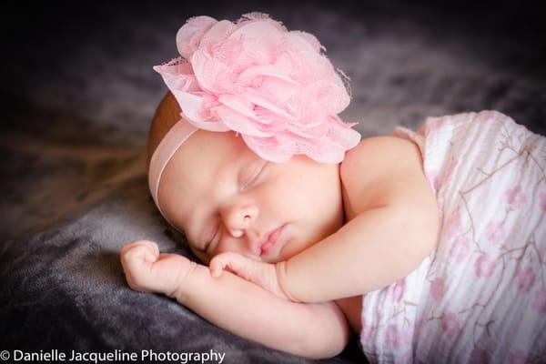 Close up photography of a newborn baby with custom background and settings.