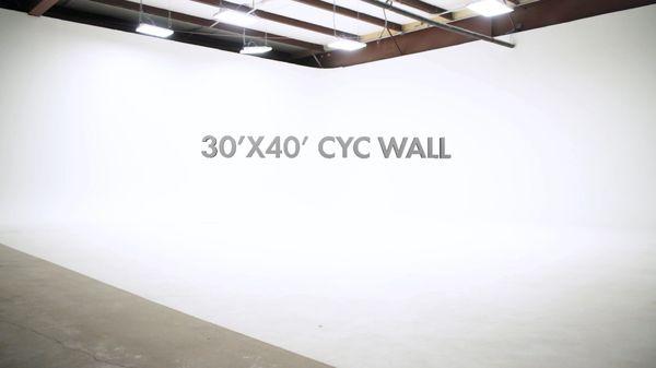 1,200 SF stage with 30'x40′ corner cyclorama, 12′ tall  12 x 22,000 Lumen LED house lighting with daylight balancing