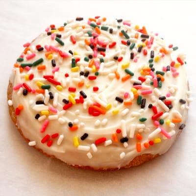 sugar cookie topped with white chocolate and sprinkles! Ready for the party.