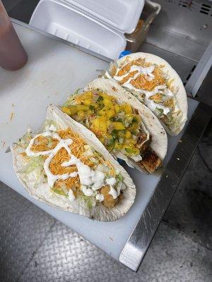 Triple Threat....Fish, Jerk Chicken, Shrimp Taco in this picture