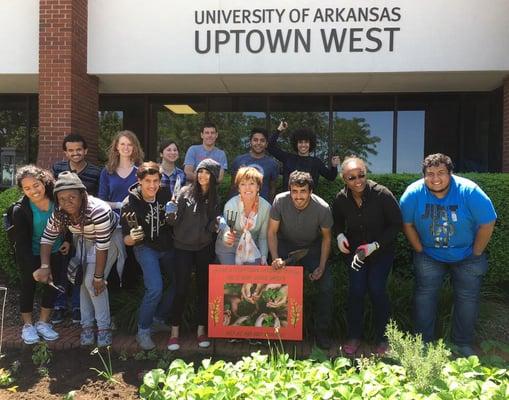 Students and staff working in the SILC garden!