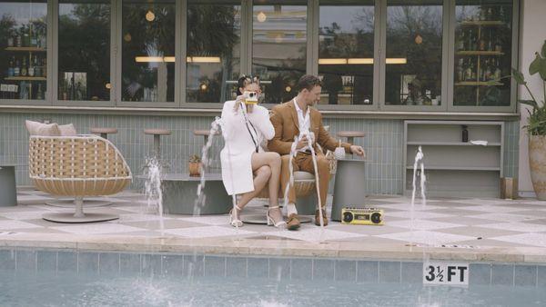 Getting away from the reception for a fun shoot by the pool is always a great idea.