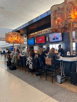 This is one of those island restaurants in the middle of the terminal walkway