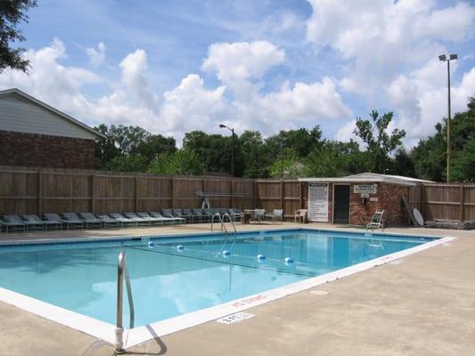 The pool is located in the center of the complex.