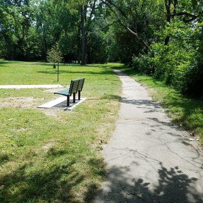 paved trail leads along the park