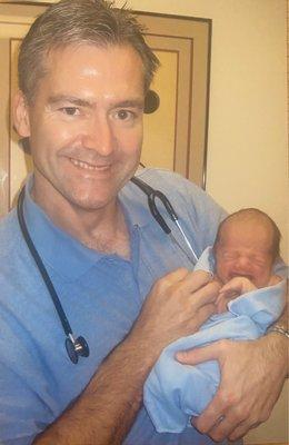 Dr. Seitter at the hospital with our son when he was born.