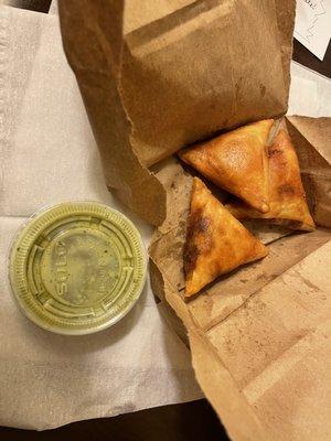 Beef samosas and green sauce