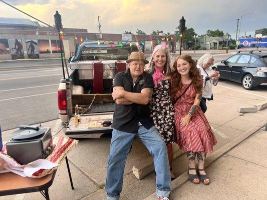 Hanging out in front of the shop on a first Friday