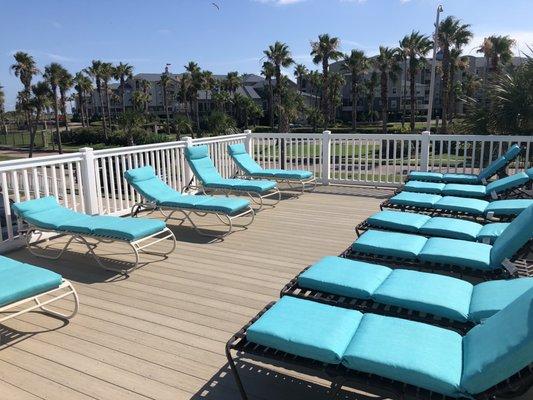 6/15/20. Late Monday afternoon. Pool area in the complex. A code and a bracelet required for each guest to gain entry. Elevated sun deck.