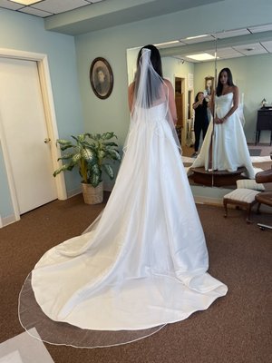 A beautiful wedding gown with a French bustle