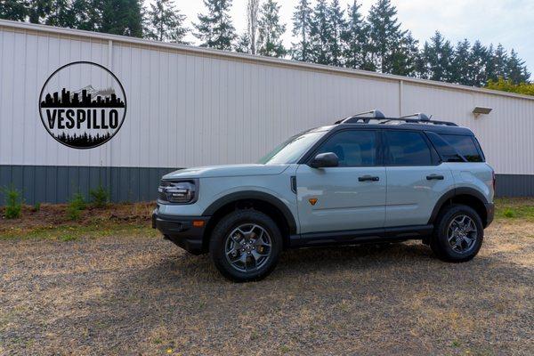 This Ford Bronco received paint protection film (clear mask, clear bra) as well as a window tint.