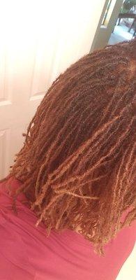 All of the dark brown running down my once golden locs. She was told to do the roots only!