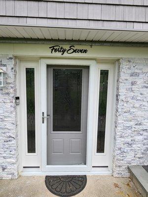 A recently installed entranceway.  This beautiful Thermatru door and Larson storm door combination is a perfect complement to each other.