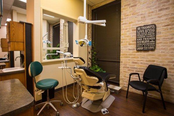 Clean and hygienic dental exam room equipped with advanced technology