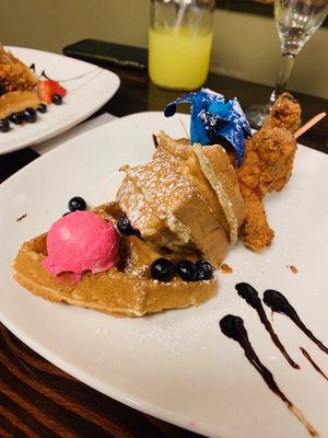 Chicken, waffles,blueberries and some fruit infused butter. Don't forget the Sangria.