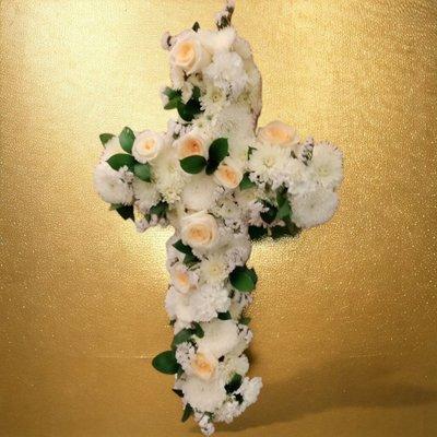 For a loved one who lived a faithful life, send prayers and blessings with our Tribute Rose Floral Cross.