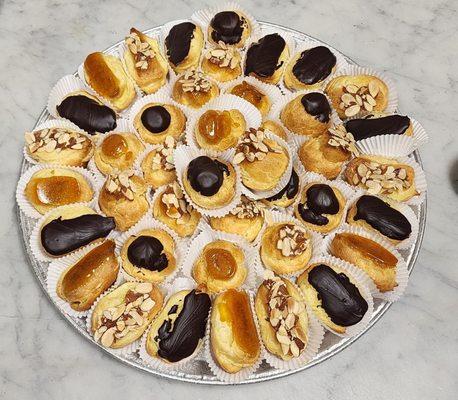 Custard Filled Creampuffs & Mini Eclairs.  Variety chosen: Chocolate, Crocan (Burnt Sugar/Caramel), and Crocan w/ Almonds.