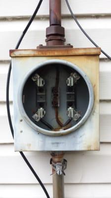 If your lights flicker, this could be why.  Rusted connection behind meter. Call us for an inspection of your equipment.