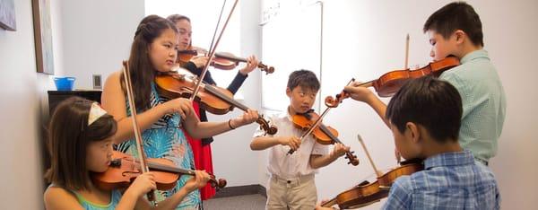 Warming up! Violin Ensemble!