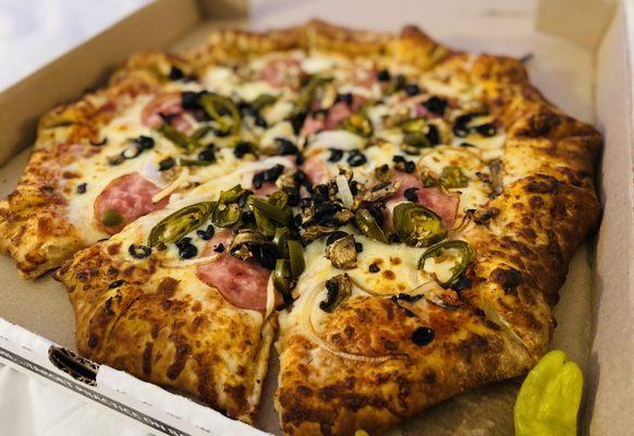 Create Your Own: Canadian bacon, black olives, mushrooms, onions, jalapeños