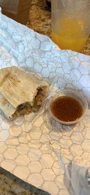 Carnitas burrito with red sauce  Sorry I ate most of it before I posted this lol