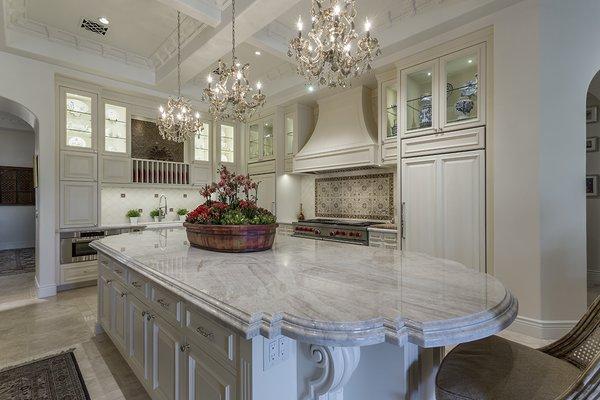 Taj Mahal kitchen island with custom edge detail.