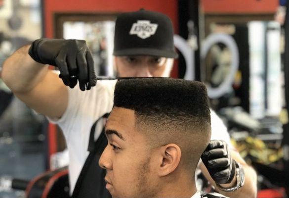 Eduardo E's high bald fade flat top