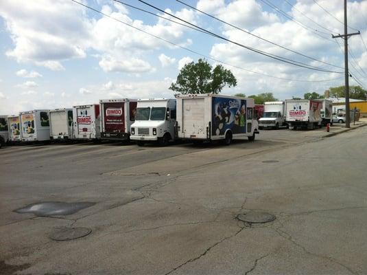 Lot full of delivery vehicles.