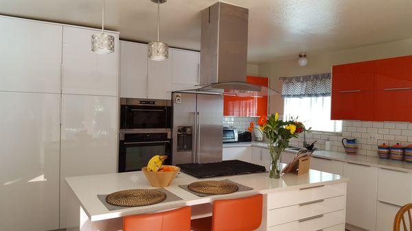 My beautiful Ikea kitchen, Ringhult cabinets with the Jarsta Orange top cupboards done by Binnenhof Construction.