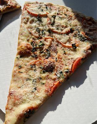 Jumbo Margherita pizza slice