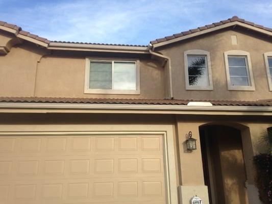 Downspout mounted in an aesthetic looking manner so it looks good from the curbside.