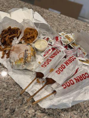 Corn dogs, burger, fries, onion rings