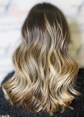 Balayage Ombré Highlights with natural color at her roots. Perfect low maintenance color with a dramatic change!