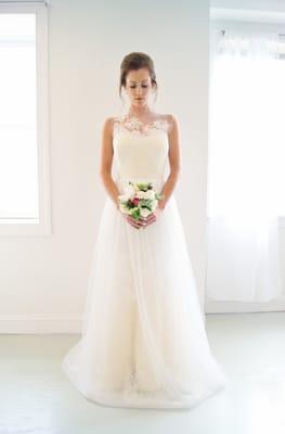 The Charlotte gown shown with a tulle over skirt- transform your bridal look between ceremony and reception!