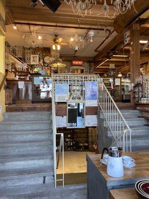 View inside the main entrance; main floor and basement access via stairs only.