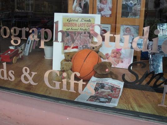 Studio and Gallery offers fine art prints, gifts, and souvenirs.  Be sure to stop and view the slide show in the window!