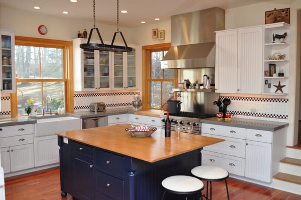 White Oak Cabinetry with custom concrete countertops