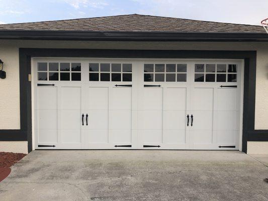 A beautiful overlay garage door with double hardware we did in Lehigh Acres.