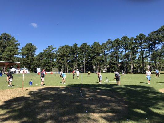 Wednesday Military Clinic getting chipping & pitching instruction.