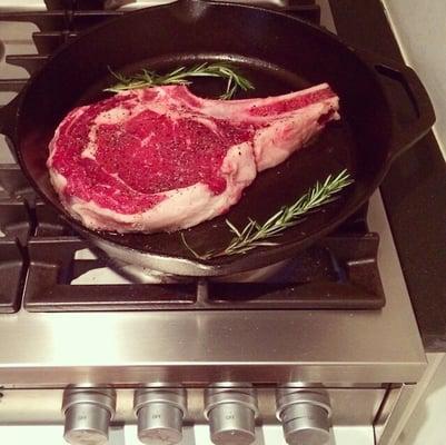 1.5 lb bone in ribeye, awesome steak from United, for ref. that's a 12 inch wide cast iron skillet...